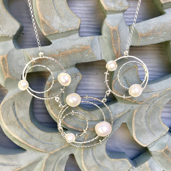 Pearl on sale orbit necklace