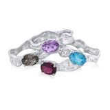 6x8mm East-West Oval Cut Ripple Ring_Rutilated Quartz_Amethyst_Blue Topaz_Rhodalite Garnet_Kristen Baird®